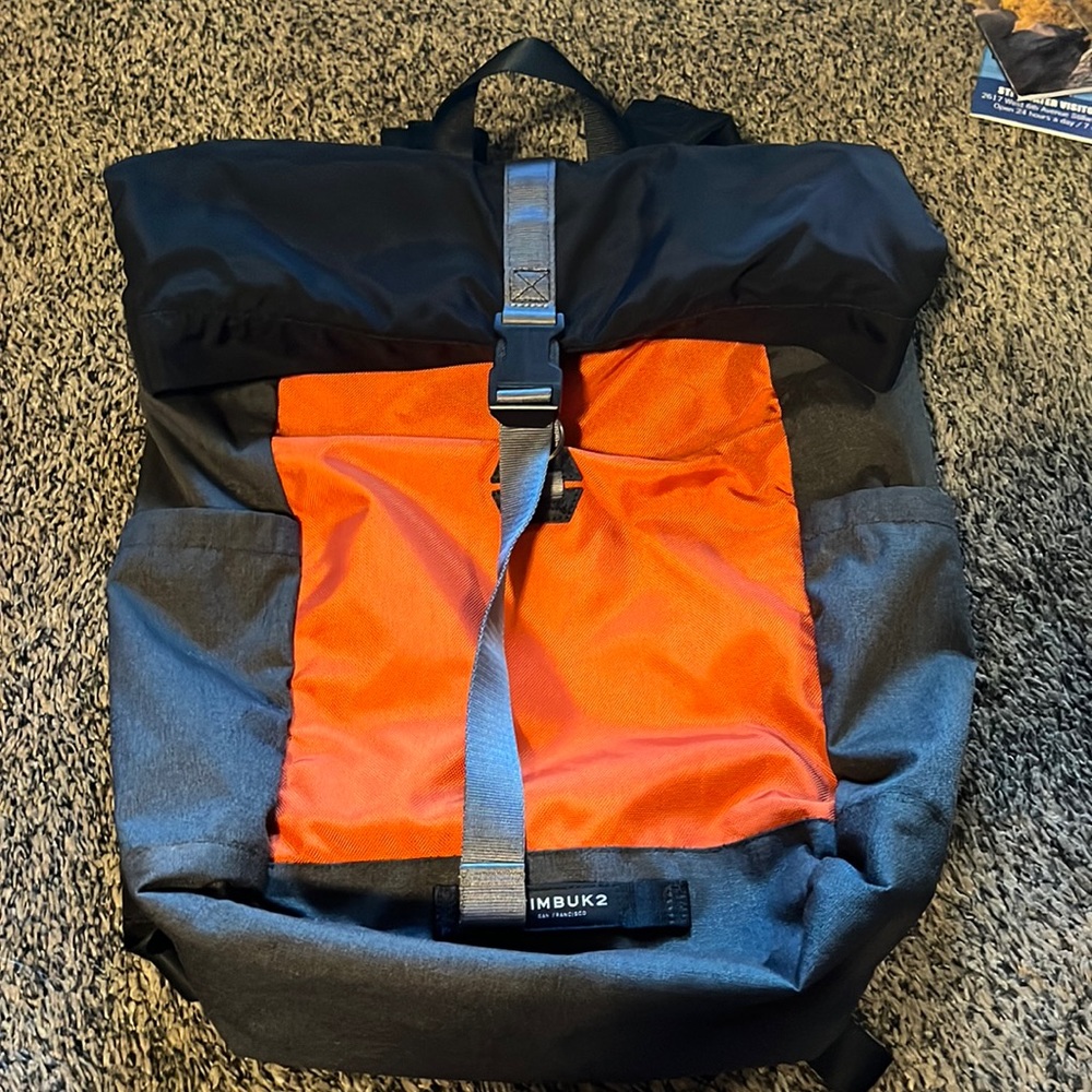 Timbuk2 black and orange roll top backpack